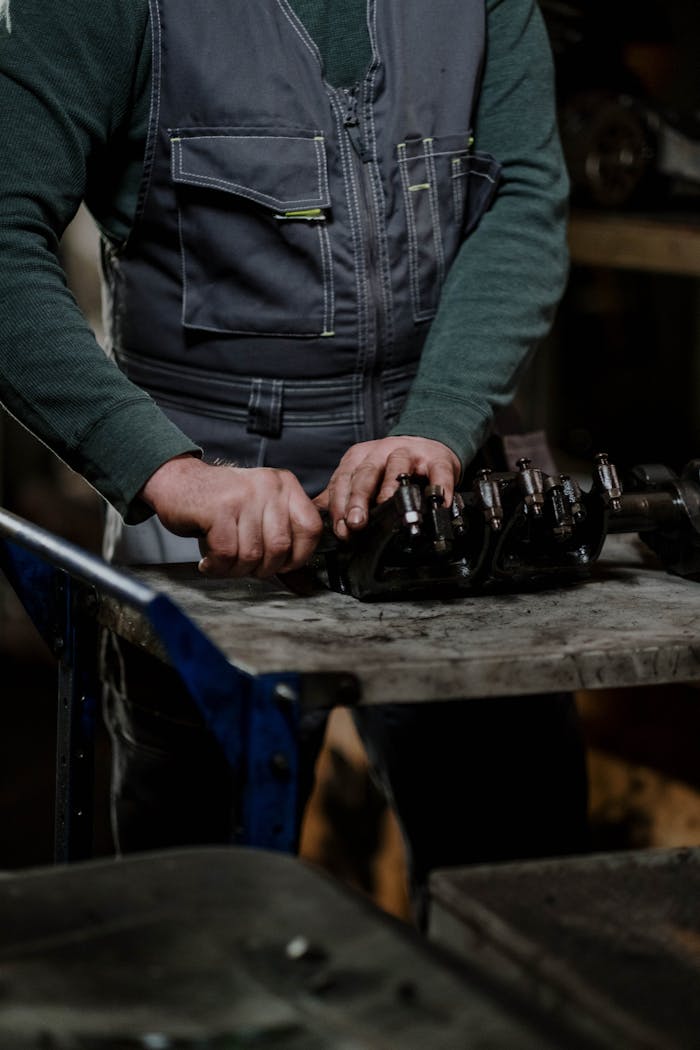 Mechanic Disassembling Valvetrain